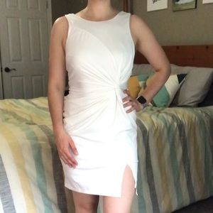 White dress with knot detail and slit